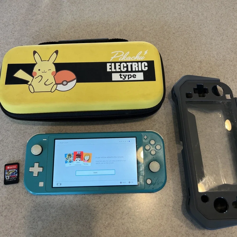 Nintendo Switch Lite Handheld Teal with Pikachu Case One Game And Console Case